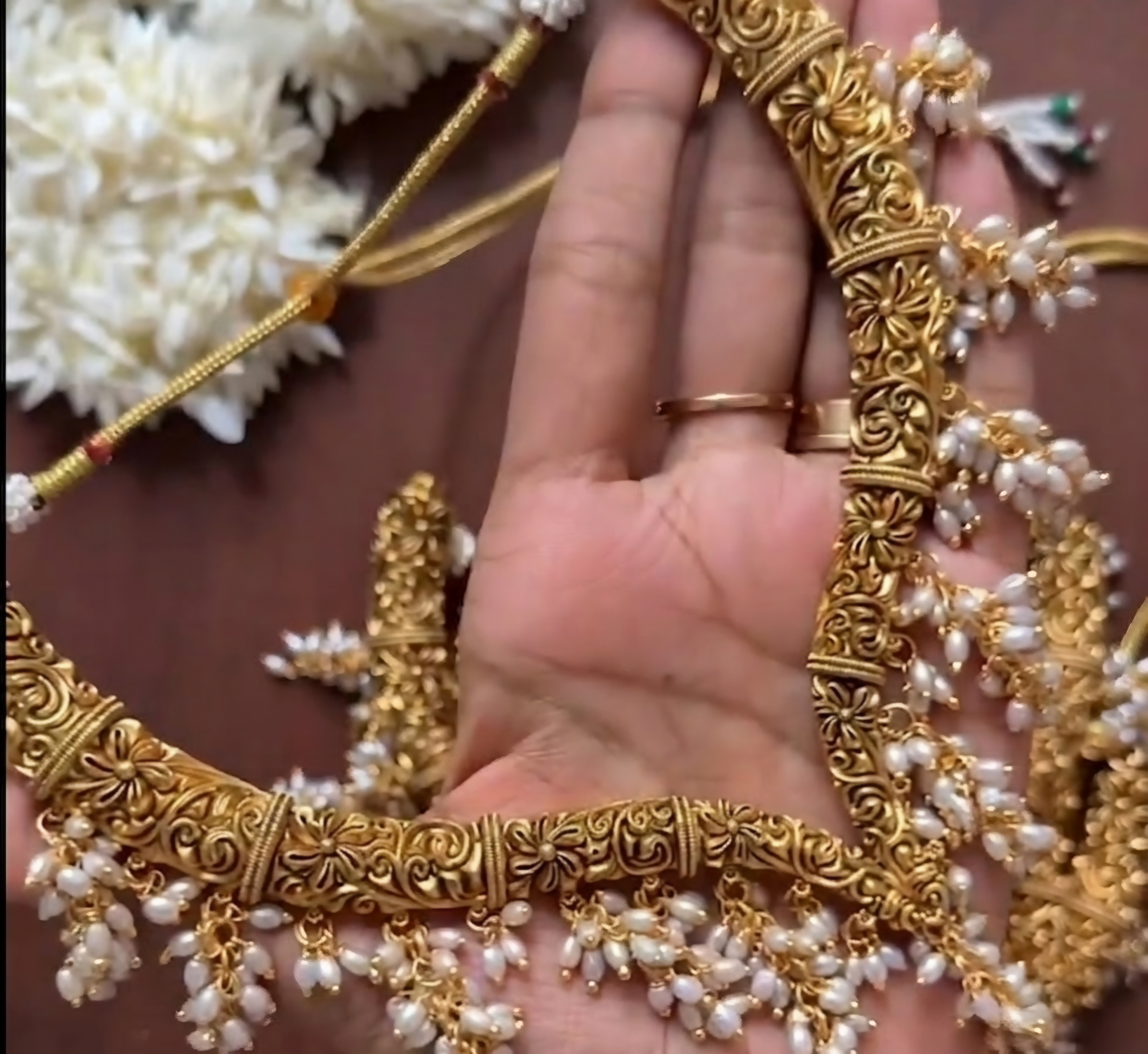 Gold hasli with rice look pearls